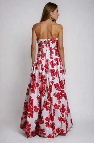 model wearing a red floral strapless bubble hem maxi dress from shopUNIQUES
