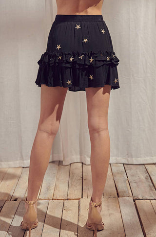 embroidered star mini skirt with ruffled edges and elastic waistband