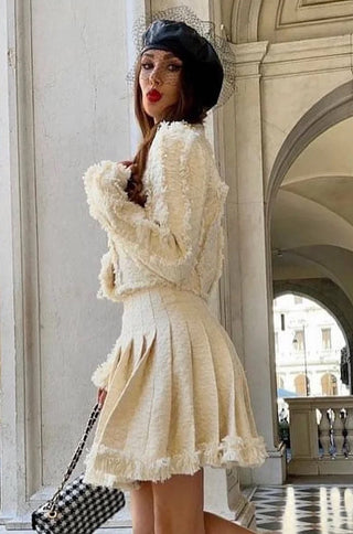 Two-piece beige tweed skirt and blazer set styled with heels – shopUNIQUES