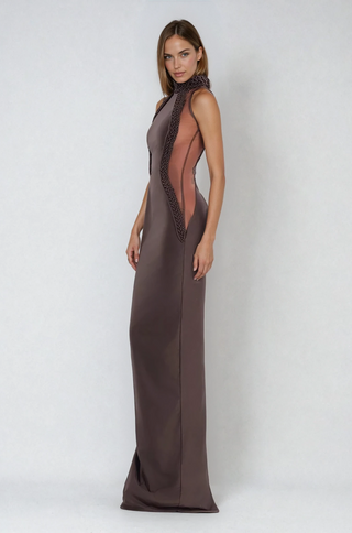 Side view of shopUNIQUES sleeveless braided trim maxi gown with illusion panels