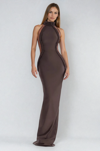 model wearing a chocolate brown braided trim high neck maxi gown from shopUNIQUES.com