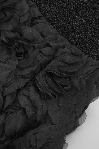 Close-up of black floral mesh hem on Midnight Bloom glitter mermaid gown