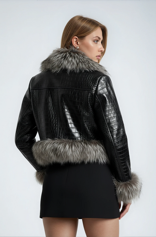 Back view of croc embossed leather crop jacket with raccoon fur trim