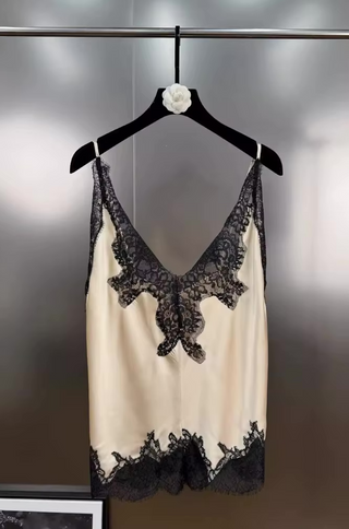 Ivory satin camisole with adjustable straps and lace appliqué