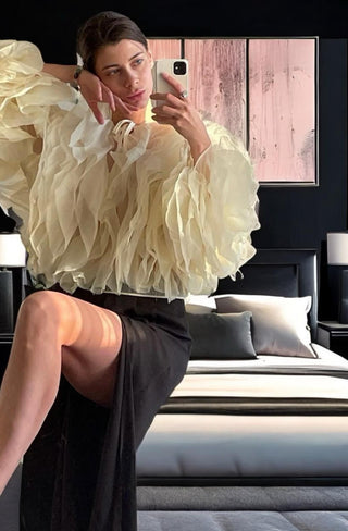 Model wearing sheer ruffle mesh blouse – Rose top from shopUNIQUES in cream