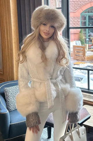 Model wears Sheri tweed jacket with fox fur cuffs and collar in white – shopUNIQUES