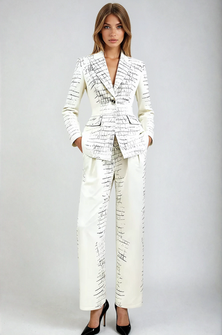 Model wearing ivory embossed blazer pants set pantsuit from shopUNIQUES